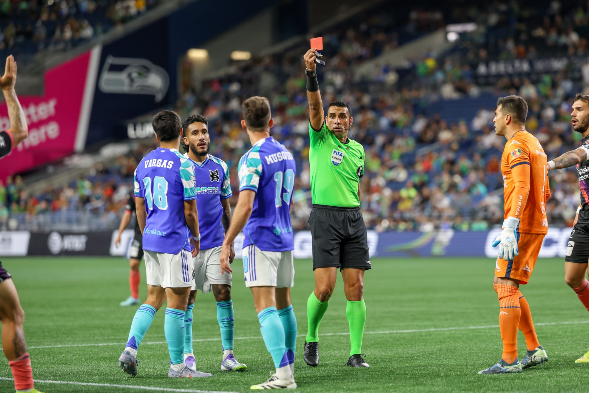 Sounders FC striker Danny Musovski (19) receives a red card against Club Puebla